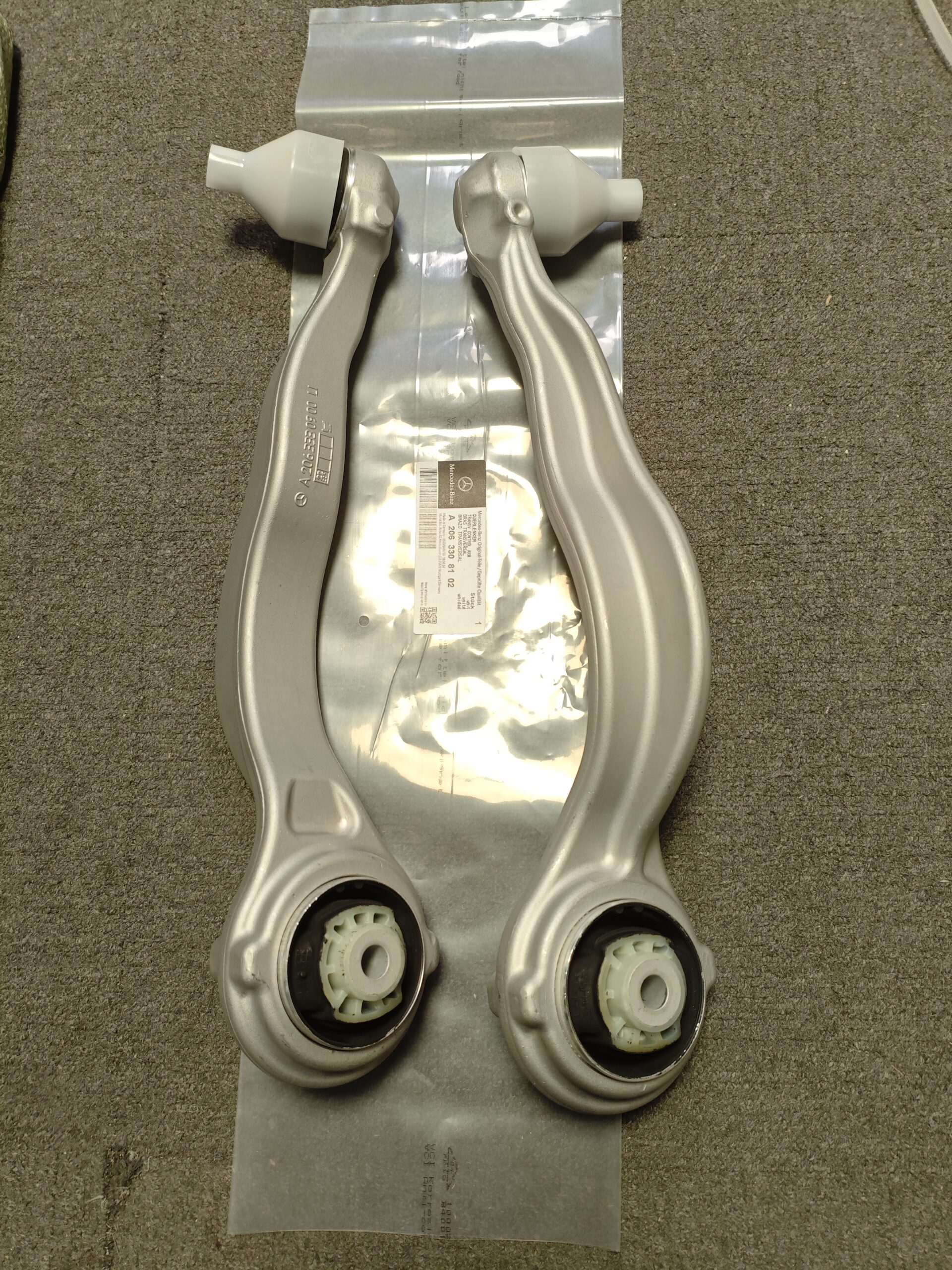 3c04ea2d5e058bbdabb99e21cc47f16 A2063308102 A2063308202 Mercedes-Benz W206 S206 Control Arm Front Axle, Left & Right 2063308102 2063308202 - Image 1